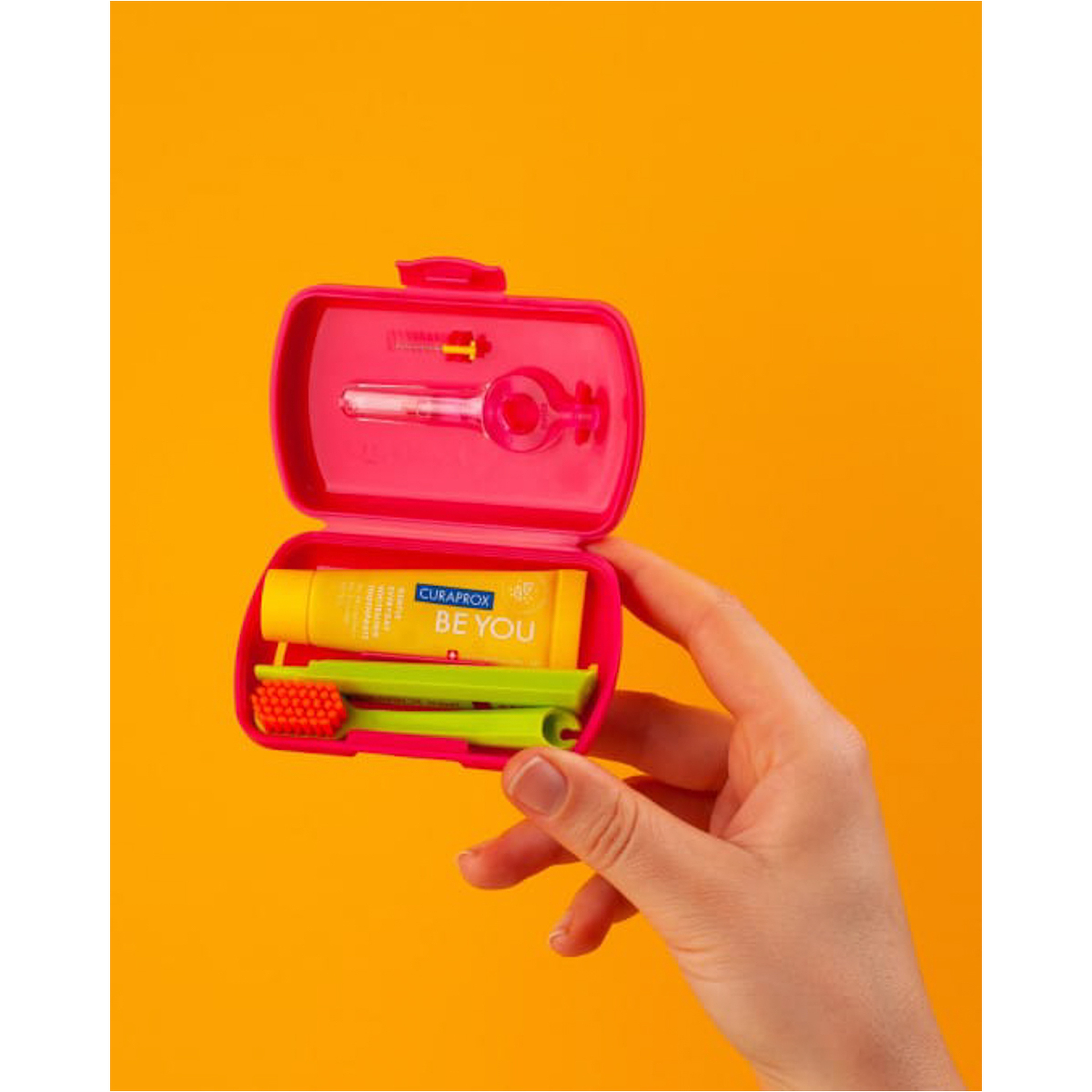 عبوة سفر كيورابروكس احمر